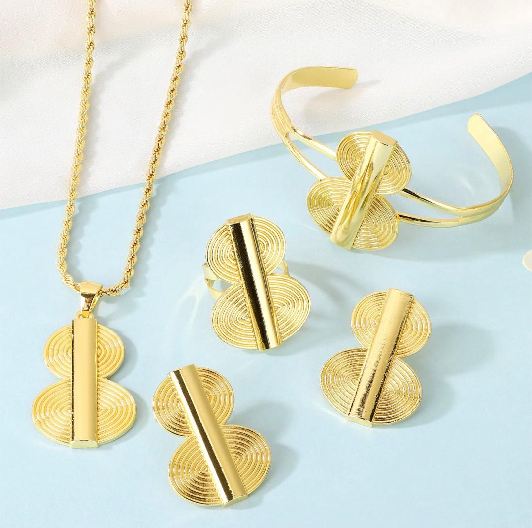 Q POKU ( Earrings . Bracelet . Finger ring .Chain and pendant ) set